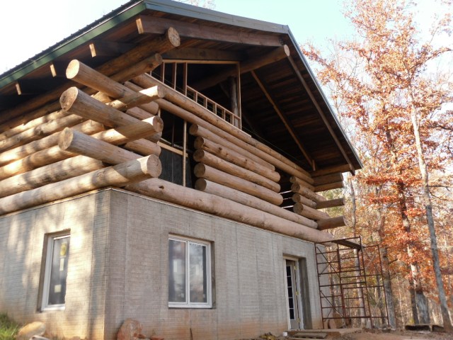 Here is the foundation before the hand fetched and laid local stones were added.